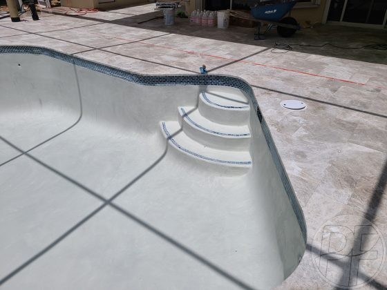PoolsFinishingInc - In the Process of the Pool Plastering